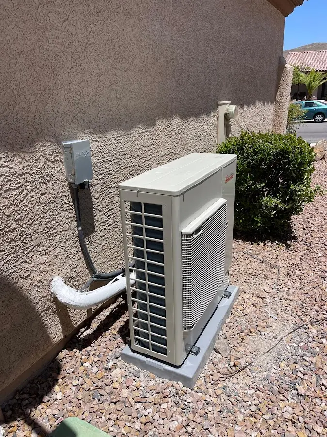 Residential air conditioning condenser unit in Brighton